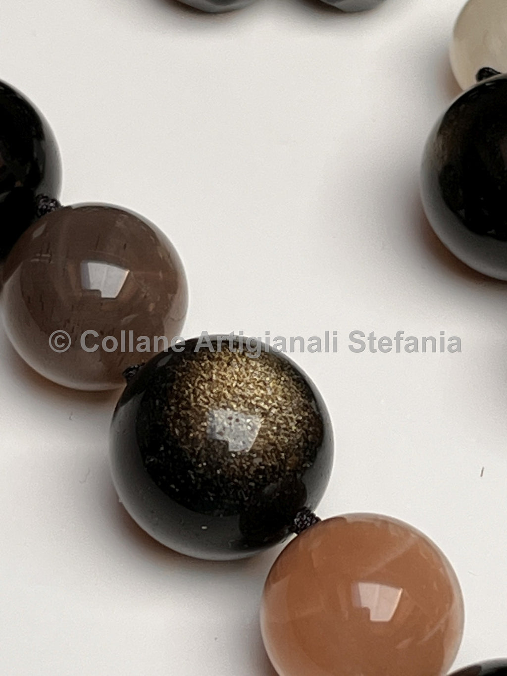 Collana con pietre dure di alta qualità di Onice, Ossidiana gold e Pietra di Luna.