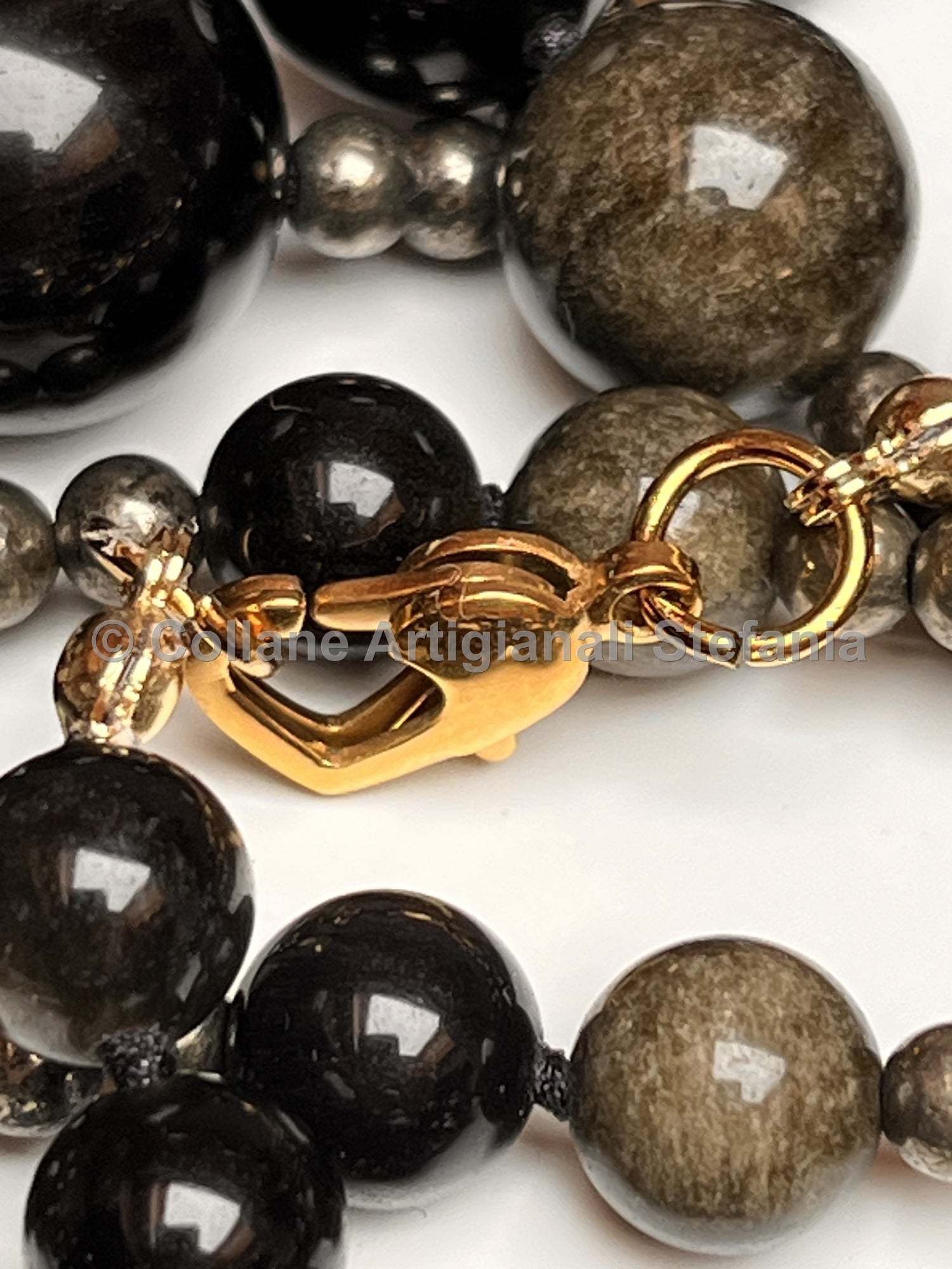 Collana con pietre dure di Ossidiana gold e Pirite