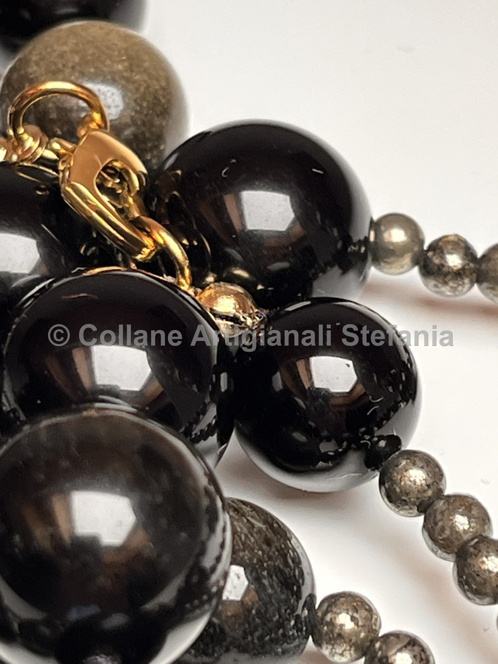 Collana con pietre dure di Ossidiana gold e Pirite