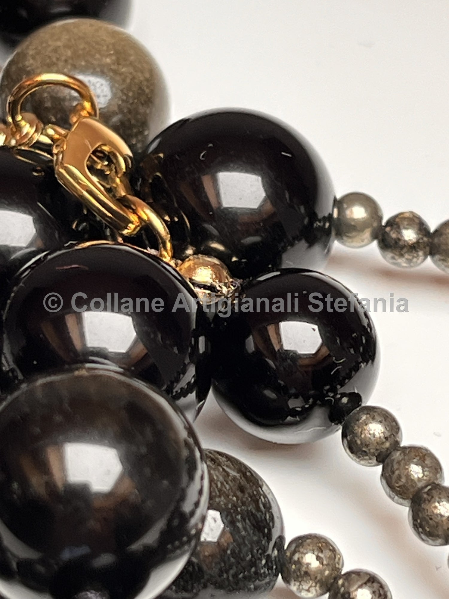 Collana con pietre dure di Ossidiana gold e Pirite