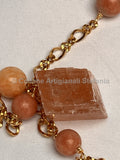 Collana con pietre dure di Calcite arancio.