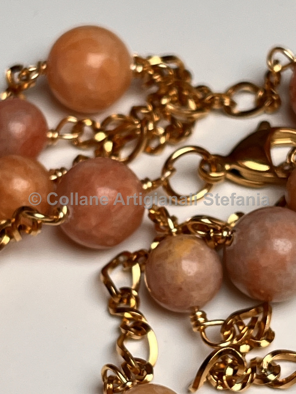 Collana con pietre dure di Calcite arancio.