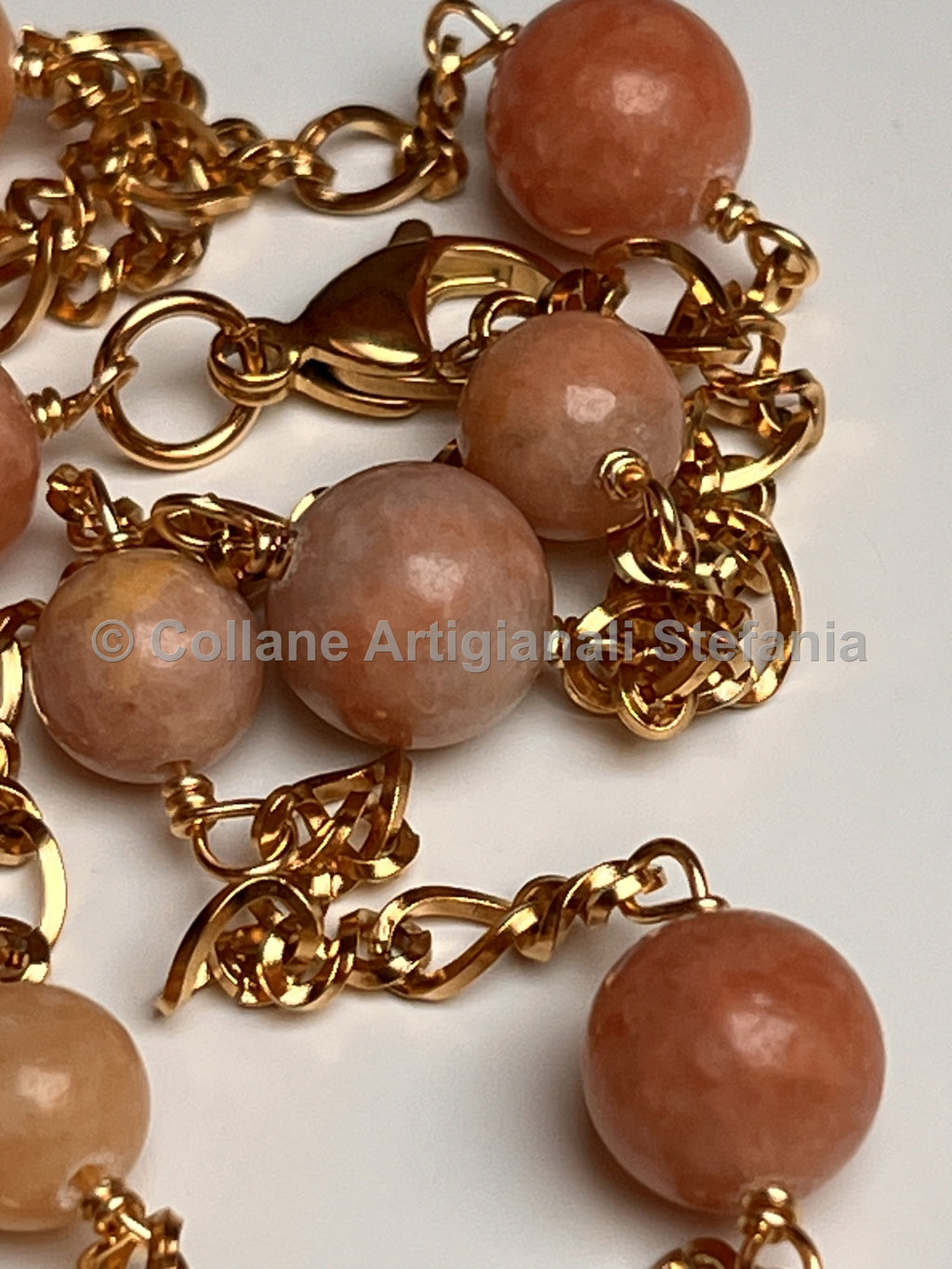 Collana con pietre dure di Calcite arancio.