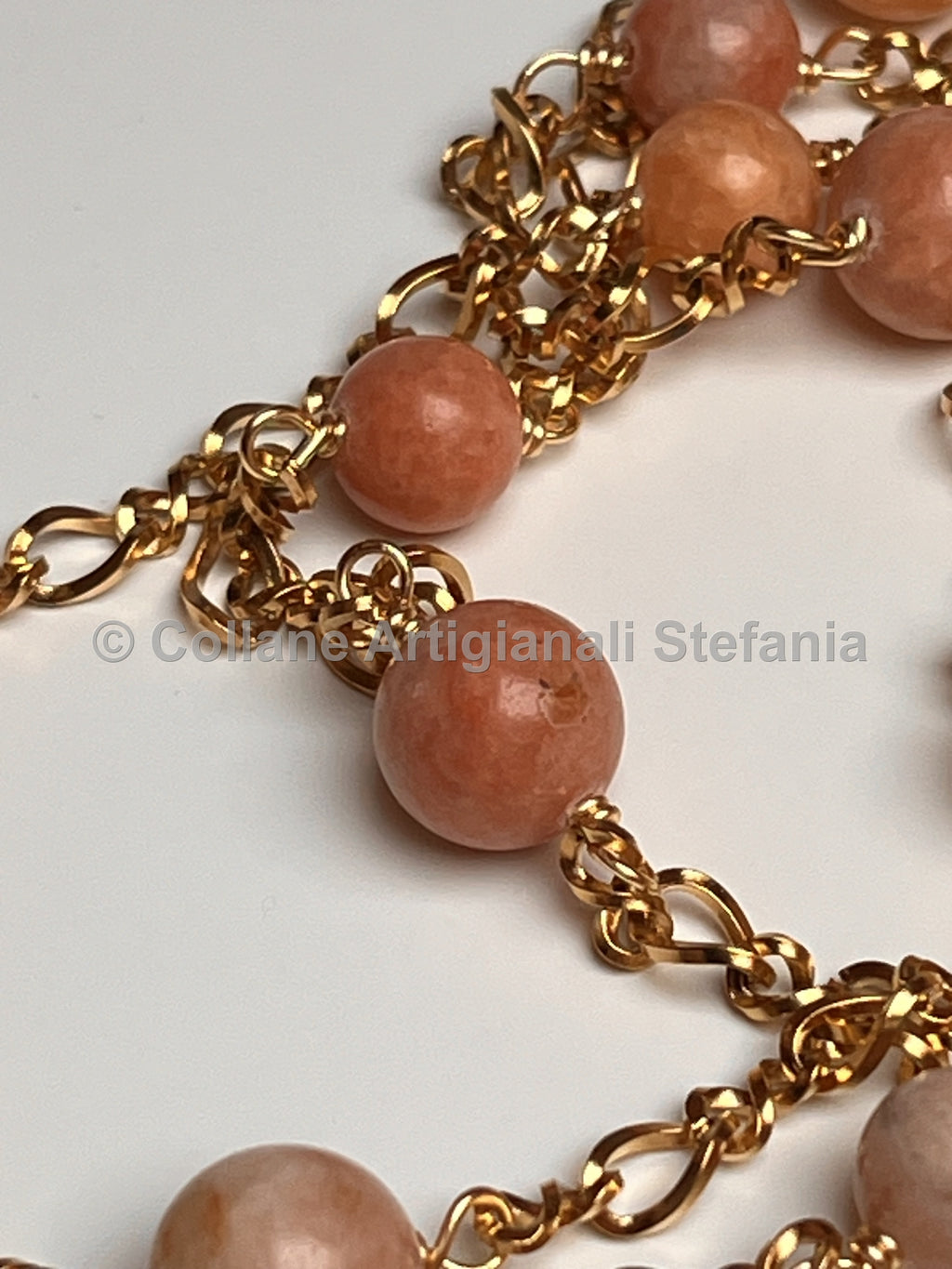 Collana con pietre dure di Calcite arancio.
