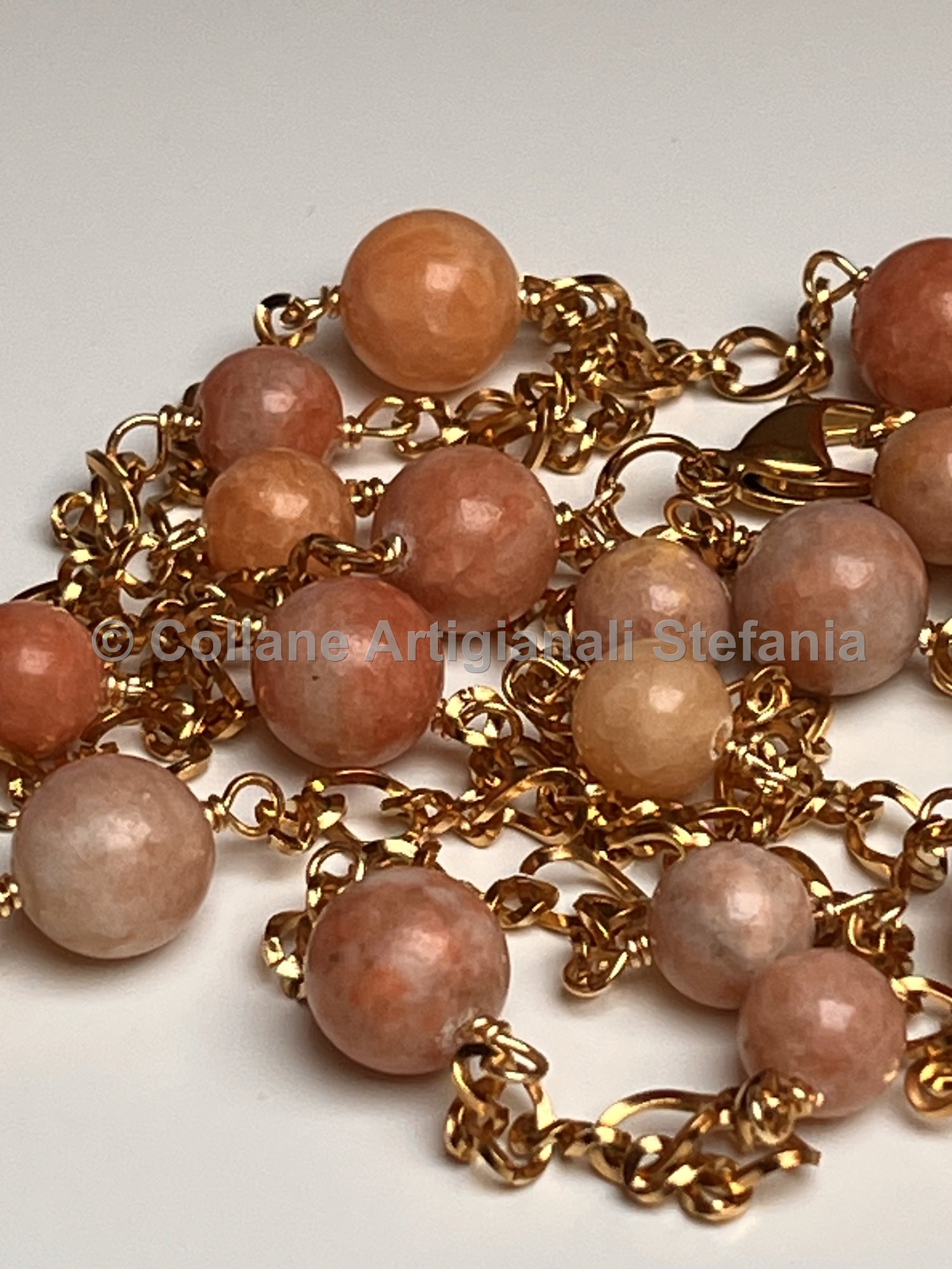 Collana con pietre dure di Calcite arancio.