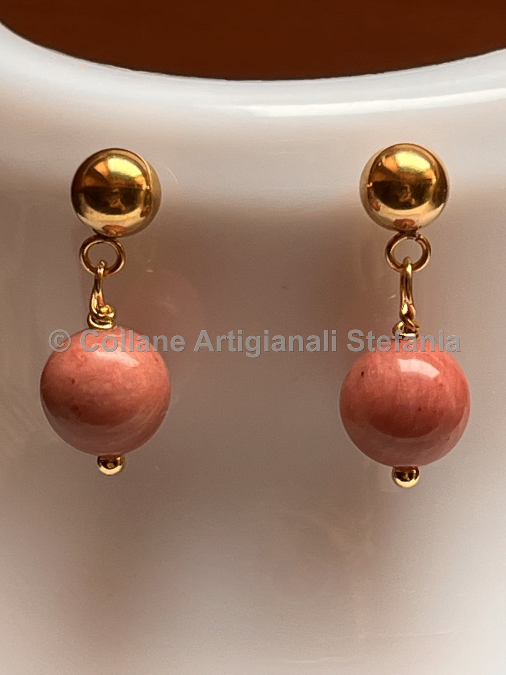 Collana e orecchini con pietre dure di Rodonite di qualità.