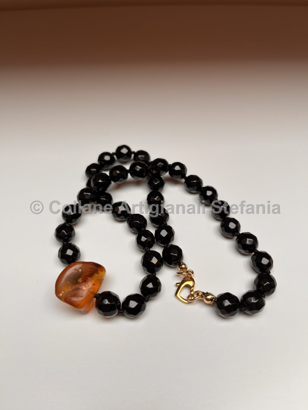Collana con pietre dure di Onice e Ambra
