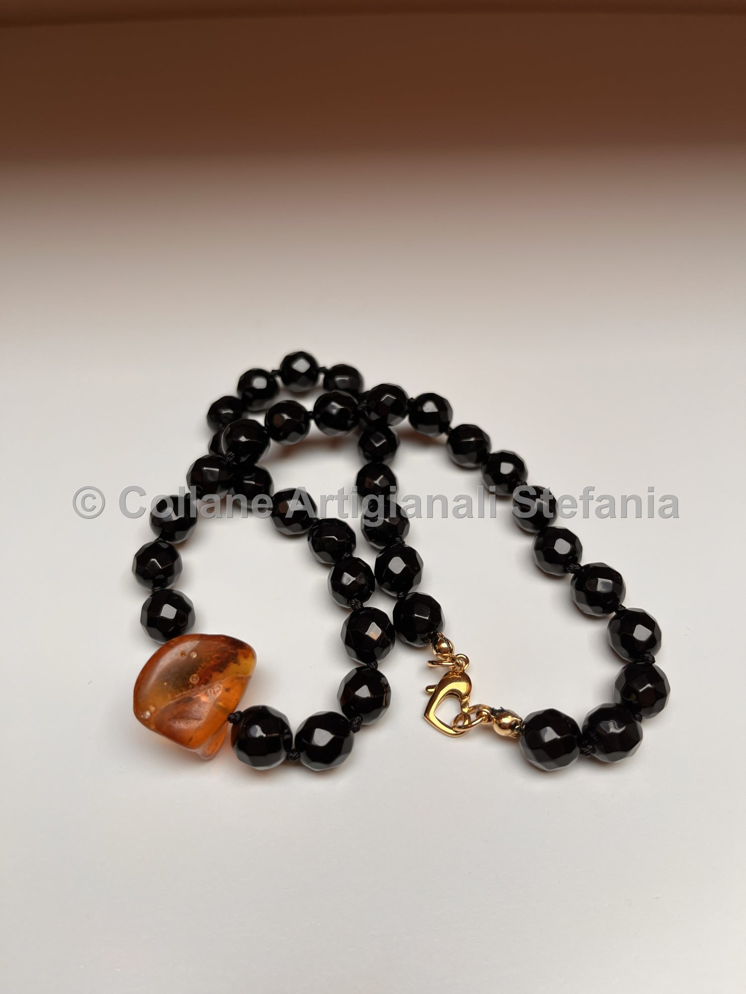 Collana con pietre dure di Onice e Ambra