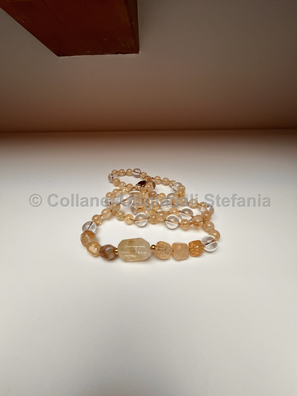 Collana lunga in quarzo citrino e quarzo ialino con dettagli laterali