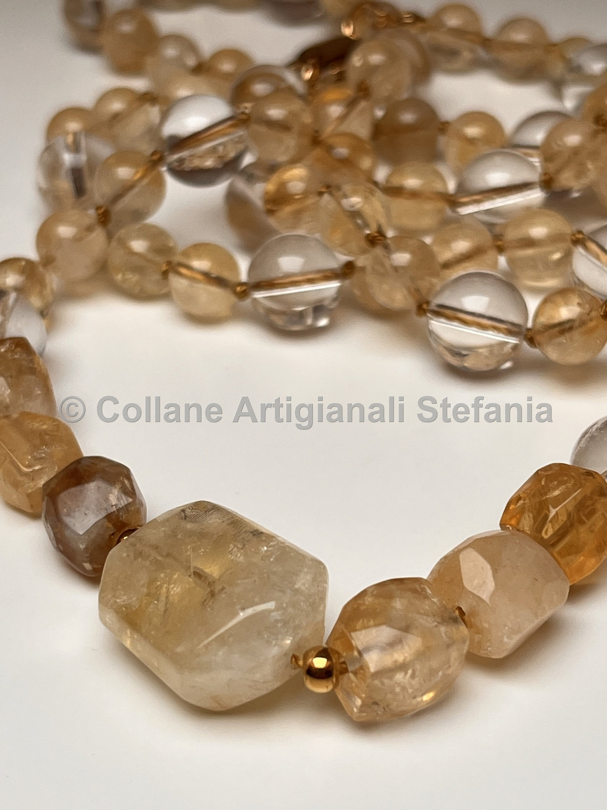Collana lunga in quarzo citrino e quarzo ialino con dettagli laterali